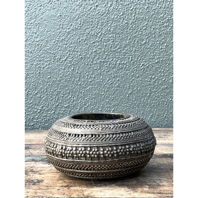 This exquisite hand-hammered brass bowl is a testament to traditional metalwork artistry, reflecting a strong Indo-Persian...