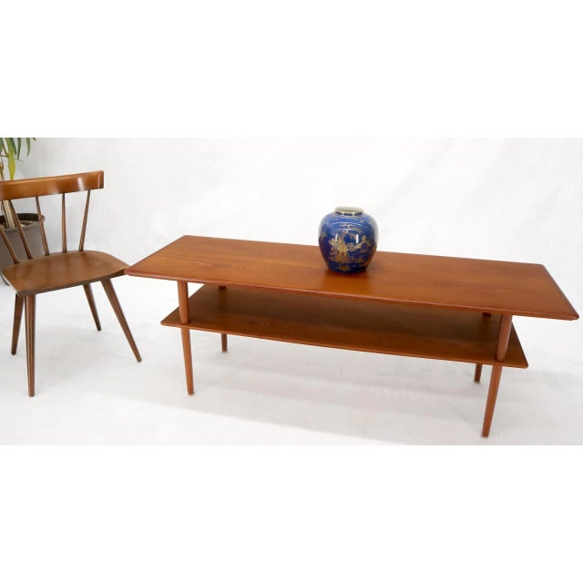 Mid-Century Modern teak one shelf coffee table. Made in Denmark.