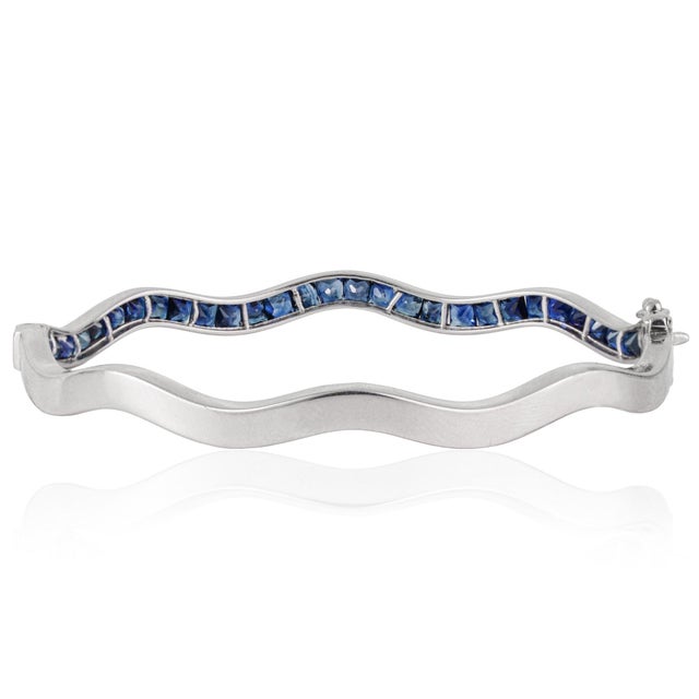 Not Yet Made - Made To Order Versatile 4.75 Ct Blue Sapphire Channel Set Hinged Wave Bangle Bracelet by Carat&Her For Sale - Image 5 of 12