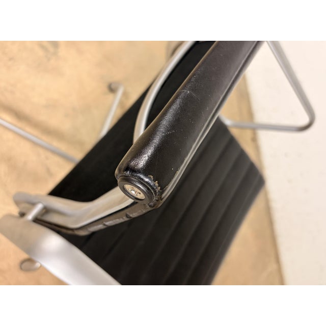 EA 108 Office Chair in Black Leather with Polished Aluminum Frame by Charles and Ray Eames for Vitra For Sale - Image 12 of 13