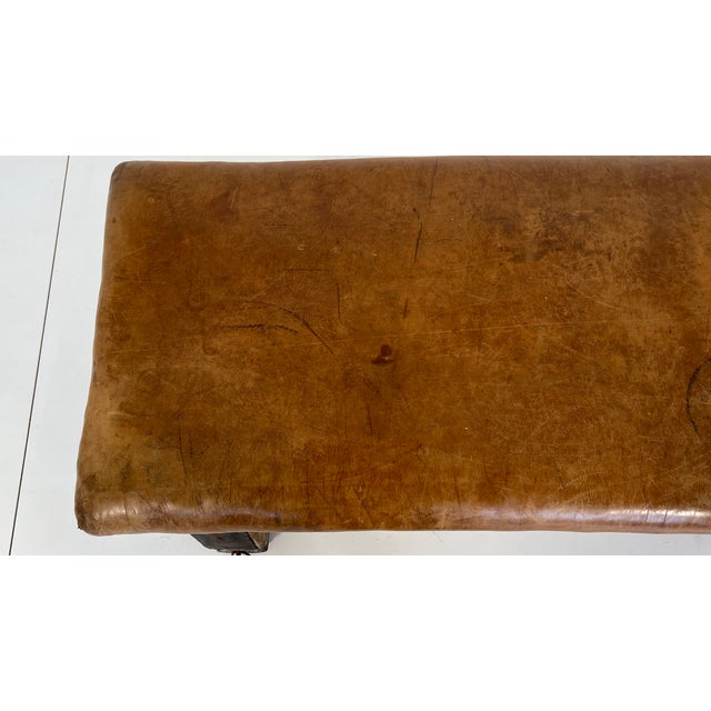 Decorative vintage gymnastic bench from the 1940s and 1950s. The robust cowhide leather and oak wood have a distinctive...