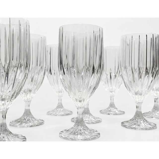 A pristine set of eight (8) iced tea goblets in the iconic "Park Lane" pattern by Mikasa. Produced from 1987 to 2010, this...