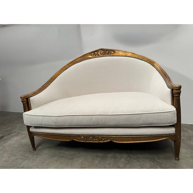 Gilt French Art Deco canape settee in ivory velvet attributed to Paul Follot. Gilt frame with beautiful carved details and...