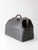 This antique early 20th century doctor’s bag carries the classic Gladstone silhouette with a wide steel frame opening,...