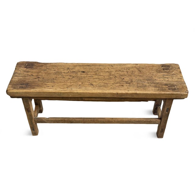 Vintage elm wood village bench with natural finish. Rustic simple design. Can be used indoors or out. Exposure to outdoor...