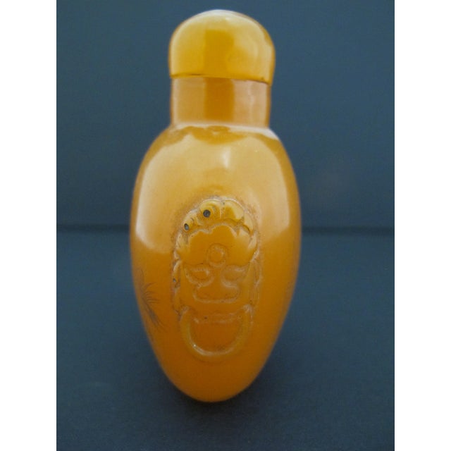 Mid 20th Century Chinese Erotic Orange Engraved Mock Mask Ring Handle Snuff Bottle For Sale - Image 5 of 11