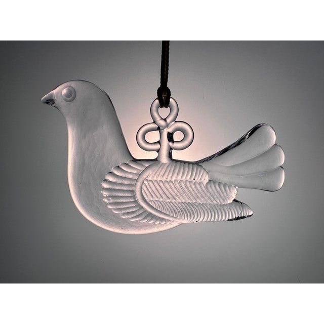 This iconic vintage glass object (suncatcher/window decoration) made of pressed, heavy crystal glass was designed in the...
