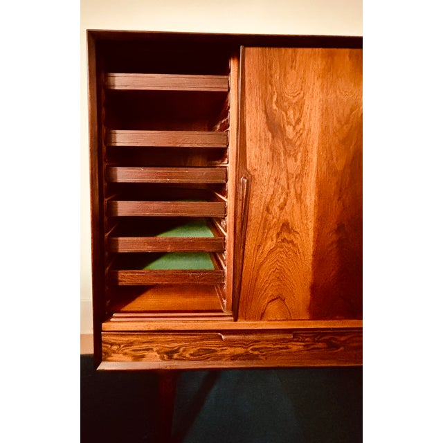 GUNNI OMANN MODEL 13 ROSEWOOD HIGHBOARD CABINET An exceptional and rare Model 13 sideboard bar cabinet in luxurious...