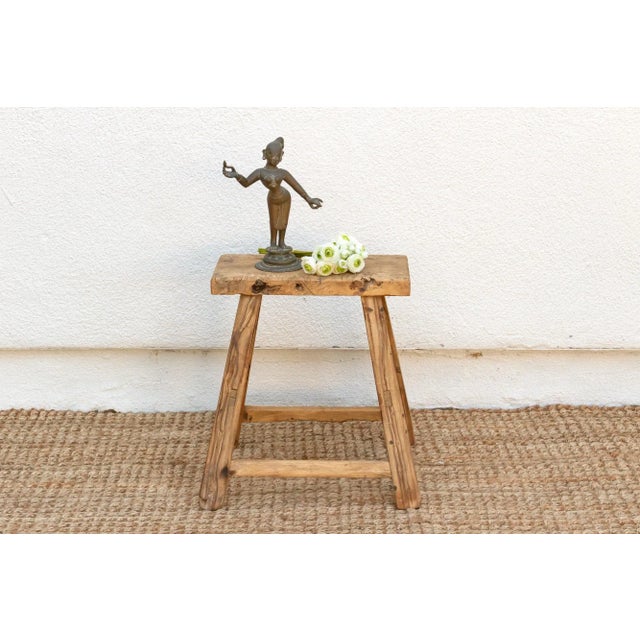 Add a touch of rustic charm with this Versatile antique Asian stool. Perfect as extra seating or a small end table, this...