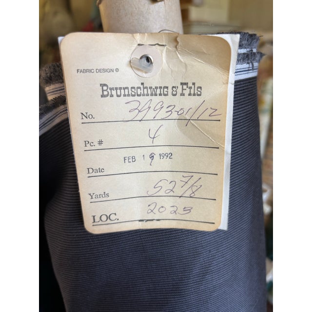 Over 52 yards of classic and traditional blue moire striped fabric from Brunschwig & Fils.
