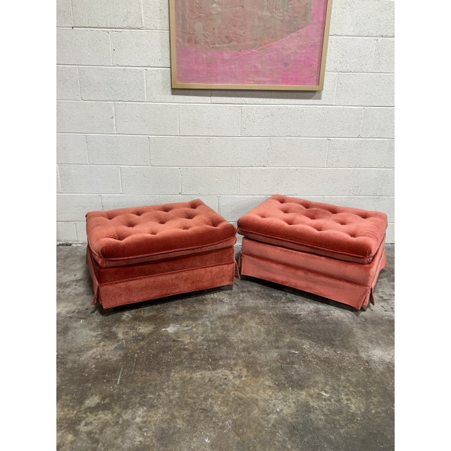 This a great orangy red velvet ottomans on casters. Great pop of color. They would great under a console with books piled...