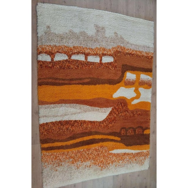 Magnificent large Scandinavian design rug in the style of Rya rugs. It has a German quality guarantee mark visible in the...