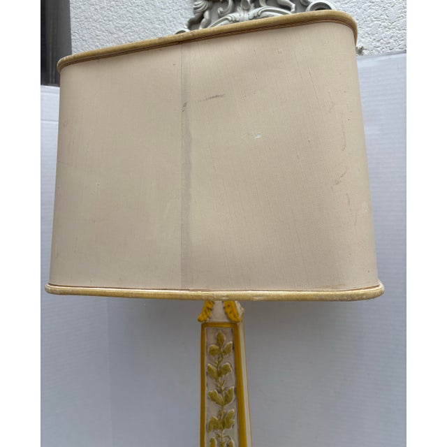 A striking, sculptural table lamp manufactured by the highly collectible mid-century producer Romanesque Originals...