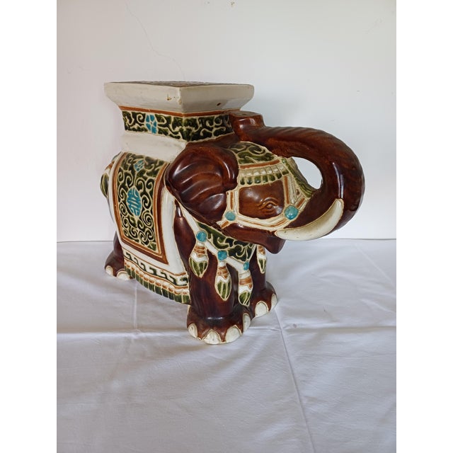 Mid-20th century glazed ceramic elephant flower plant holder. Handmade of ceramic. Nice addition to your home, inside or...