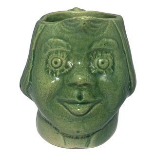 Antique Glazed Stoneware Face Creamer: Green Ceramic Girl For Sale