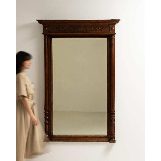 A cabinet whose dark walnut, turned finial gives it real character at first glance. Originating in France during 1900s, it...