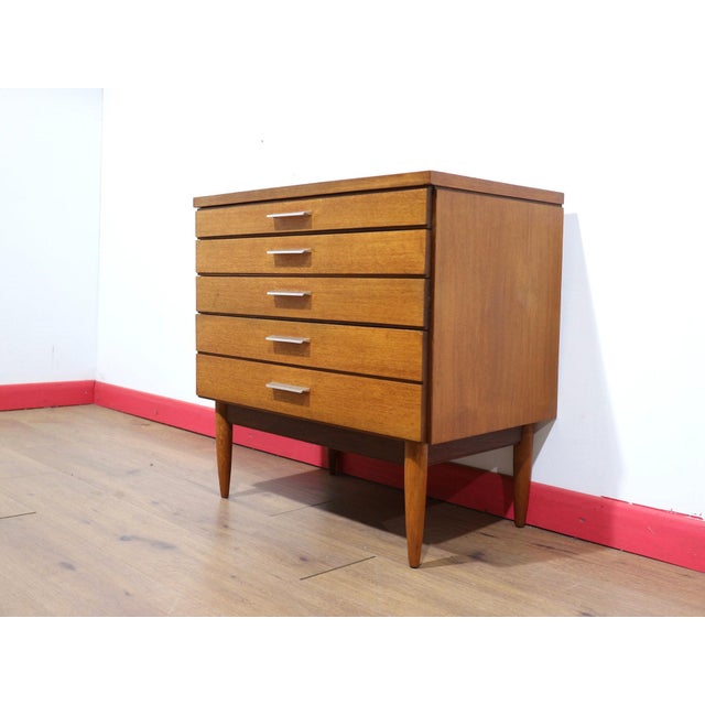 This Mid Century Modern Vintage Teak Short Dresser Drawers by White and Newton is a gorgeous short dresser that seamlessly...