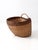 Vintage large handwoven wicker gathering basket featuring a beautiful two-tone weave, sturdy bentwood handle, and raised...