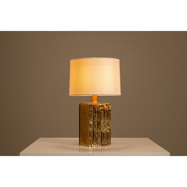 A sculptural composition of light and material, this table lamp attributed to Angelo Brotto offers a rich encounter with...