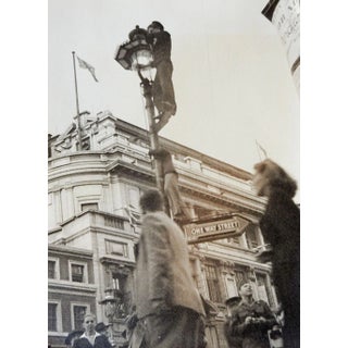 Vintage Cityscape Street Light Climbers Photograph For Sale