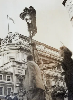 Vintage Cityscape Street Light Climbers Photograph