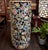 A tall Chinese export porcelain umbrella and walking stick stand, finely decorated in a dense, famille noire-influenced...