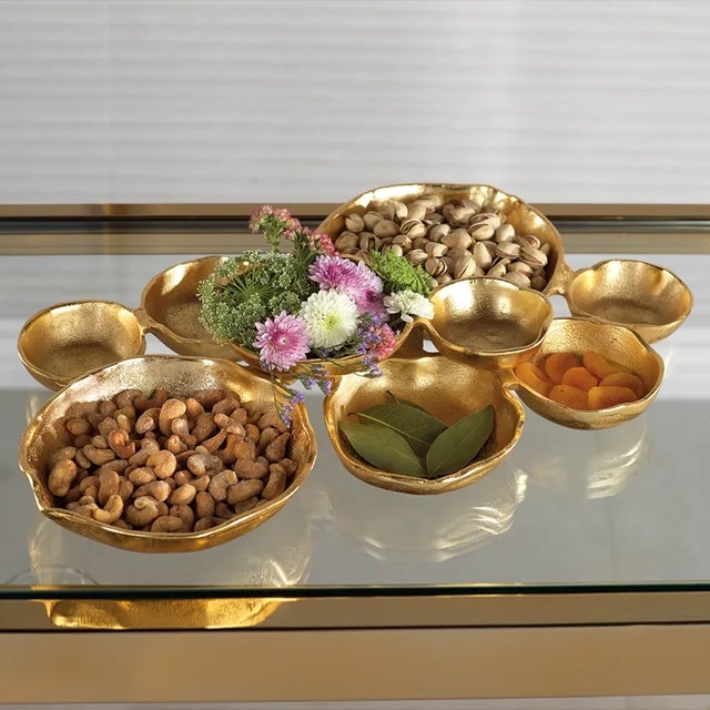 This unique and organic gold serving piece features nine bowls for entertaining. Use as a charcuteirere tray, decorative...