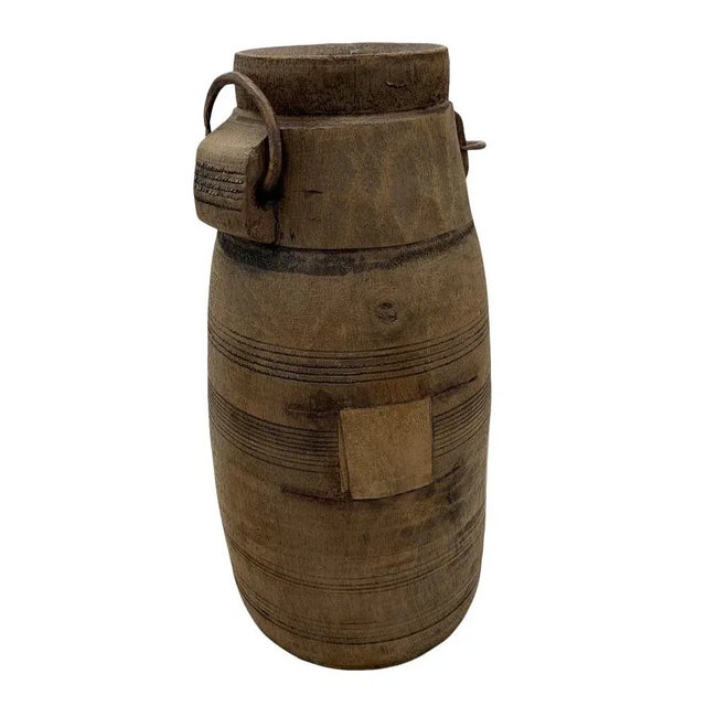 These vintage wood pots from India are truly special and when one considers they were carved from a single piece of wood...