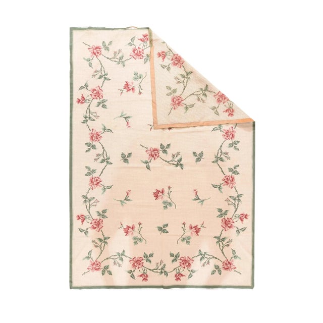 The sandy-straw field shows an open pattern of drifting rose stems, within an undulating en suite rose, and leaf thorny...