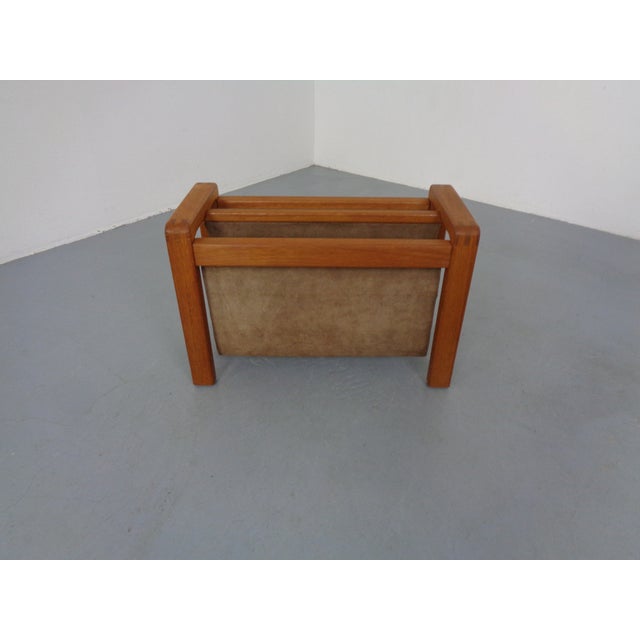 Newspaper rack in solid teak and leather from Salling Stolefabrik dating from the 1960s. This piece has an attribution...