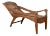 Antique Indonesian Reclining Plantation Chair with Bamboo Slats and Carved Decor For Sale
