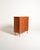Teak frame with six drawers, two smaller ones at the top and four larger ones with oval oak handles. Tapered legs and a...