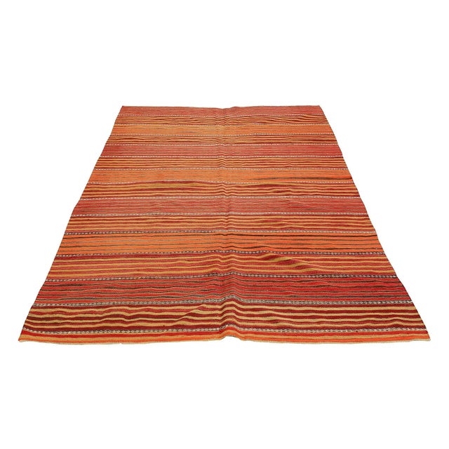 Handwoven vintage striped kilim rug from Denizli region of Turkey. Approximatelly 45-55 years old. In very good condition.