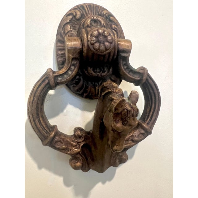 A sculptural Solid Bronze Door Knocker with a Horse Head. The, almost 4 pound, knocker is very special and beautifully...