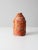 A vintage studio pottery vase with an expressive free-form silhouette and richly layered ridge texture. Finished in a...