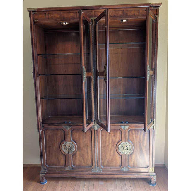 We inherited this beautiful 1981 Henredon one-piece hutch from a relative (we assume the original owner) 20 years ago. It...