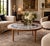 Exceptional vintage Danish Modern round coffee table featuring a beautifully detailed blue and white ceramic tile top...
