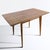 This vintage extending dining table offers a perfect blend of style and functionality for mid-century modern furniture...