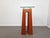 Fantastic postmodern pillar in wood with a thick glass top that rests on grey metal balls. Looks great as a standalone...