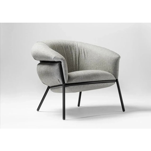 Armchair designed by Stephen Burks manufactured by BD Barcelona. An iron tubular (25mm) structured armchair. Seat and...