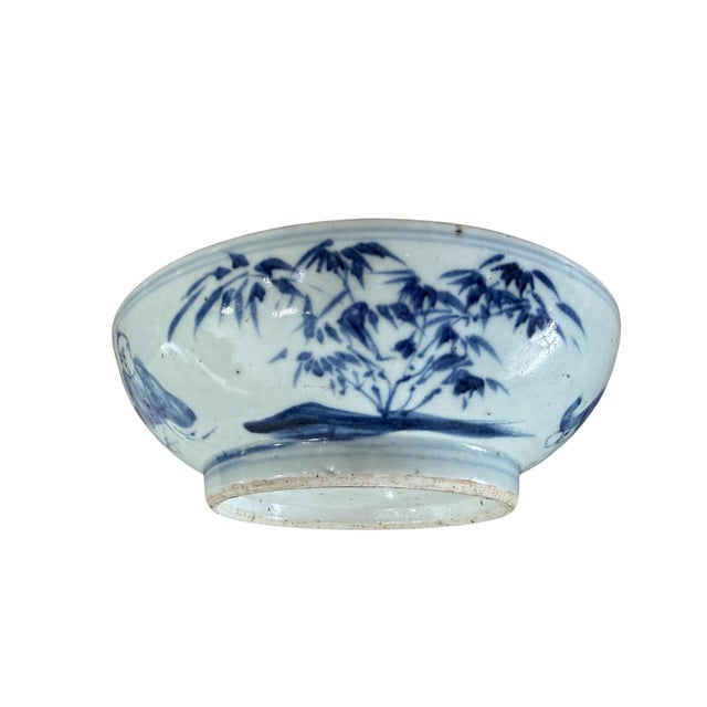 Superb early 19th century Chinoiserie bowl in blue and white porcelain with hand-painted imagery of playing boys , bamboo...
