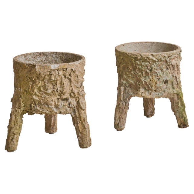 A French faux bois footed planter from the 1940s, sculpted in concrete to evoke the organic texture of carved wood. Raised...