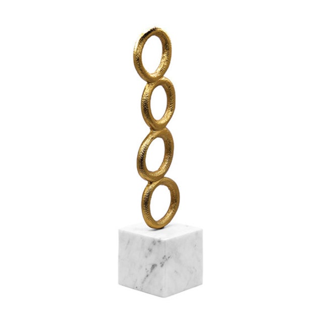 New special order item. Not vintage. STACKED CIRCLE SHAPED TEXTURED BRASS SCULPTURE WITH WHITE MARBLE BASE 4"W x 18"H x...