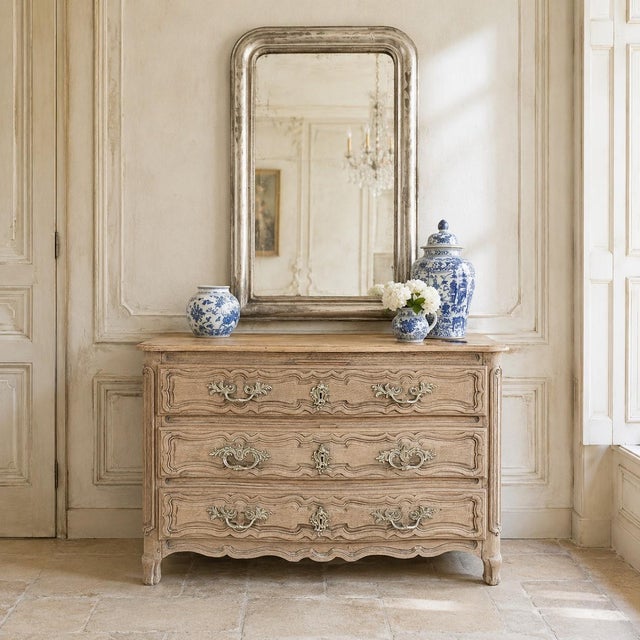 18th Century French Louis XV Period Stripped Oak Commode presents the warmth and authenticity of provincial craftsmanship...