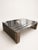 Statement coffee table by Timothy Oulton, the Zazenne model, featuring a polished metal slatted design with a low,...