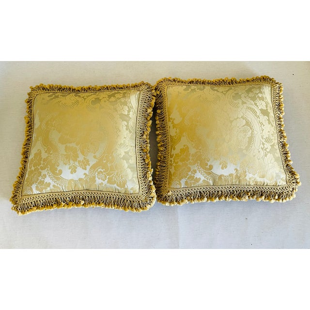Gorgeous pair of vintage Italian Fortuny silk pillows with feather down inserts and tassels trim.