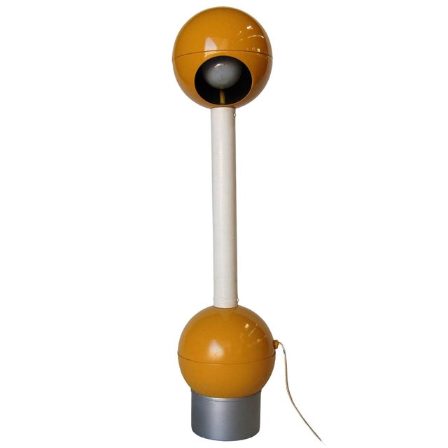 Modernist yellow and white metal adjustable Barbell desk lamp by George Kovacs. No signature present Measures 22" High x...