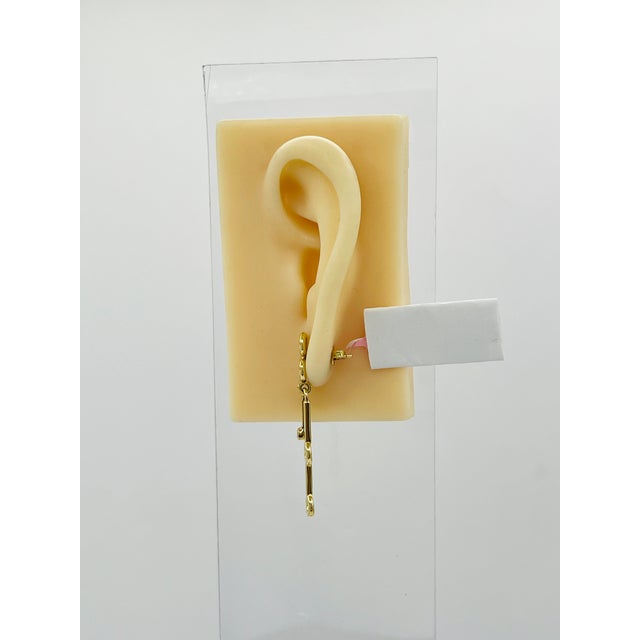 Beautiful dangle earrings with good quality, white, and bright diamond rounds. Handmade in 18k yellow gold. Push back...