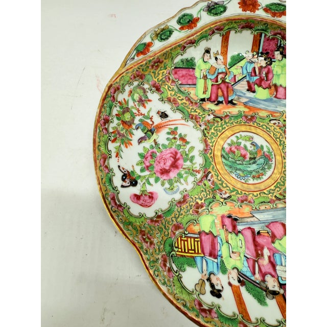 This richly enameled porcelain dish is a 19th-century example of Chinese export ware in the Rose Medallion tradition,...