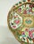 This richly enameled porcelain dish is a 19th-century example of Chinese export ware in the Rose Medallion tradition,...